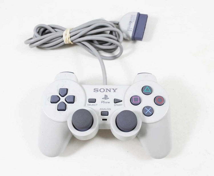 PS1-Original-Dual-Shock-CLEAR-WHITE-Controller.webp