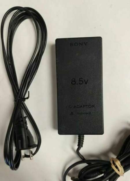Sony-Playstation-2-Slim-Original-AC-Adapter-and-cord-450x625-1.jpg